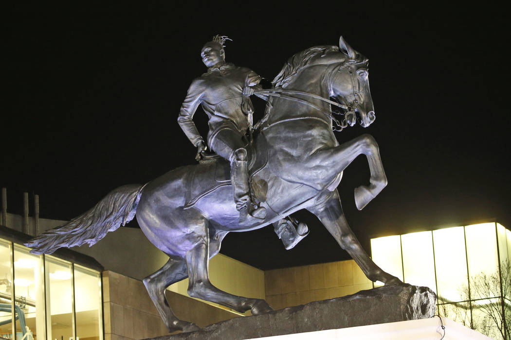 The statue titled Rumor's of War by artist Kehinde Wiley gets fully unveiled after the tarp cov ...