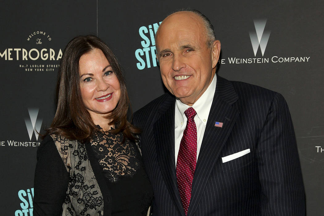 FILE - In this Tuesday, April 12, 2016, file photo, Judith Giuliani, left, and former New York ...