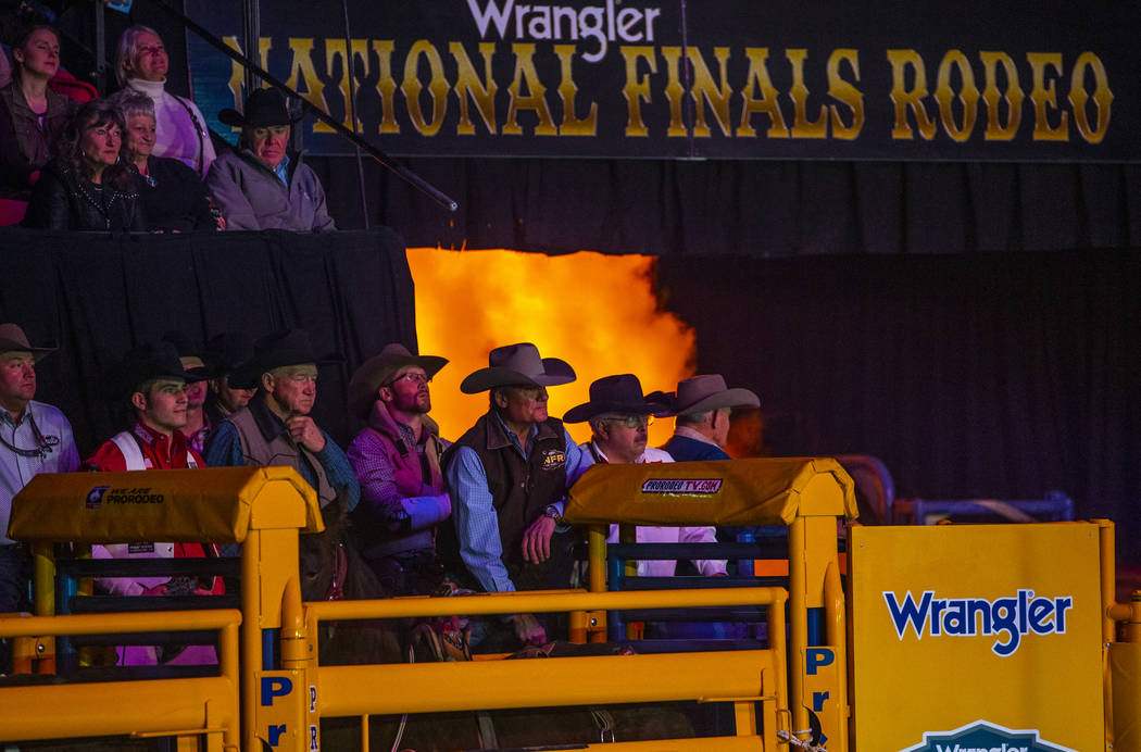 Cowboys and fans are bathed in fireworks light during the opening of the sixth go-round of the ...