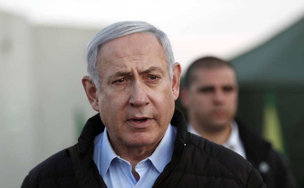 FILE - in this Nov. 24, 2019 file photo, Israeli Prime Minister Benjamin Netanyahu, looks on du ...