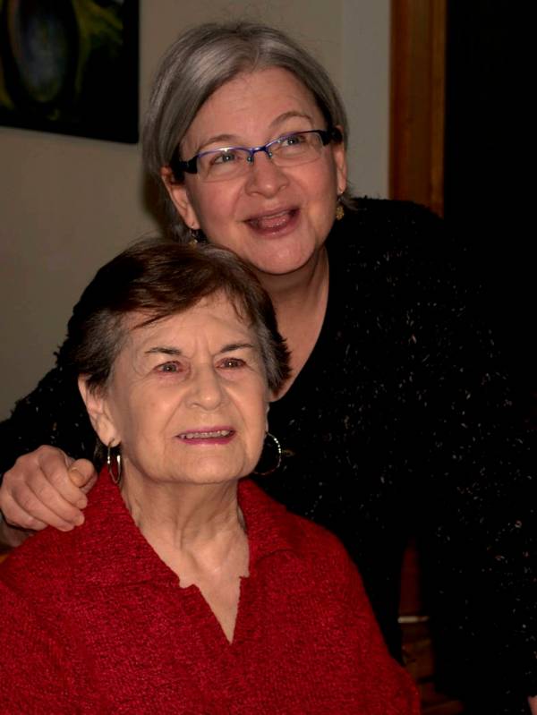 In this 2013 photo provided by Thomas Marrinson, Allison Beach, right, poses with her mother, K ...