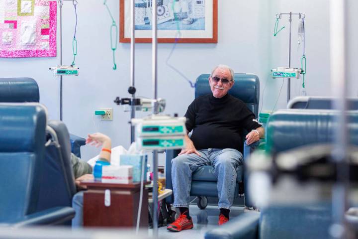 Fred Warnick, 73, the first patient in the world on a new lymphoma clinical trial, receives his ...