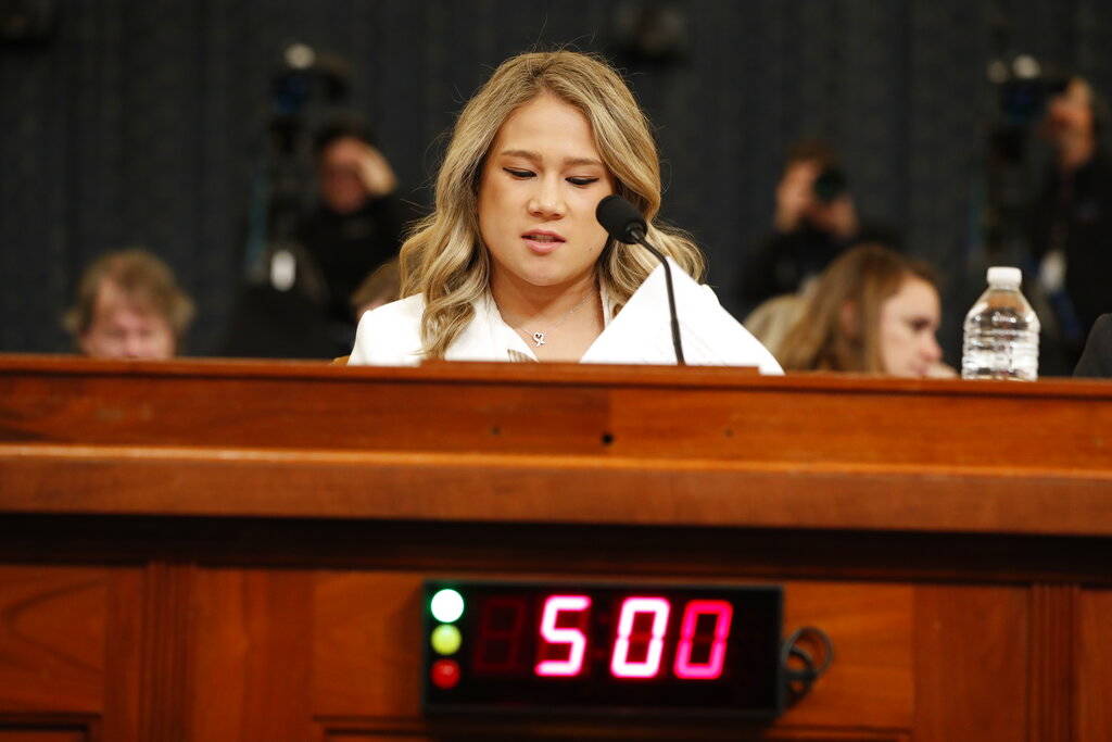 Madeline Strasser, chief clerk for the majority on the House Judiciary Committee reads the arti ...