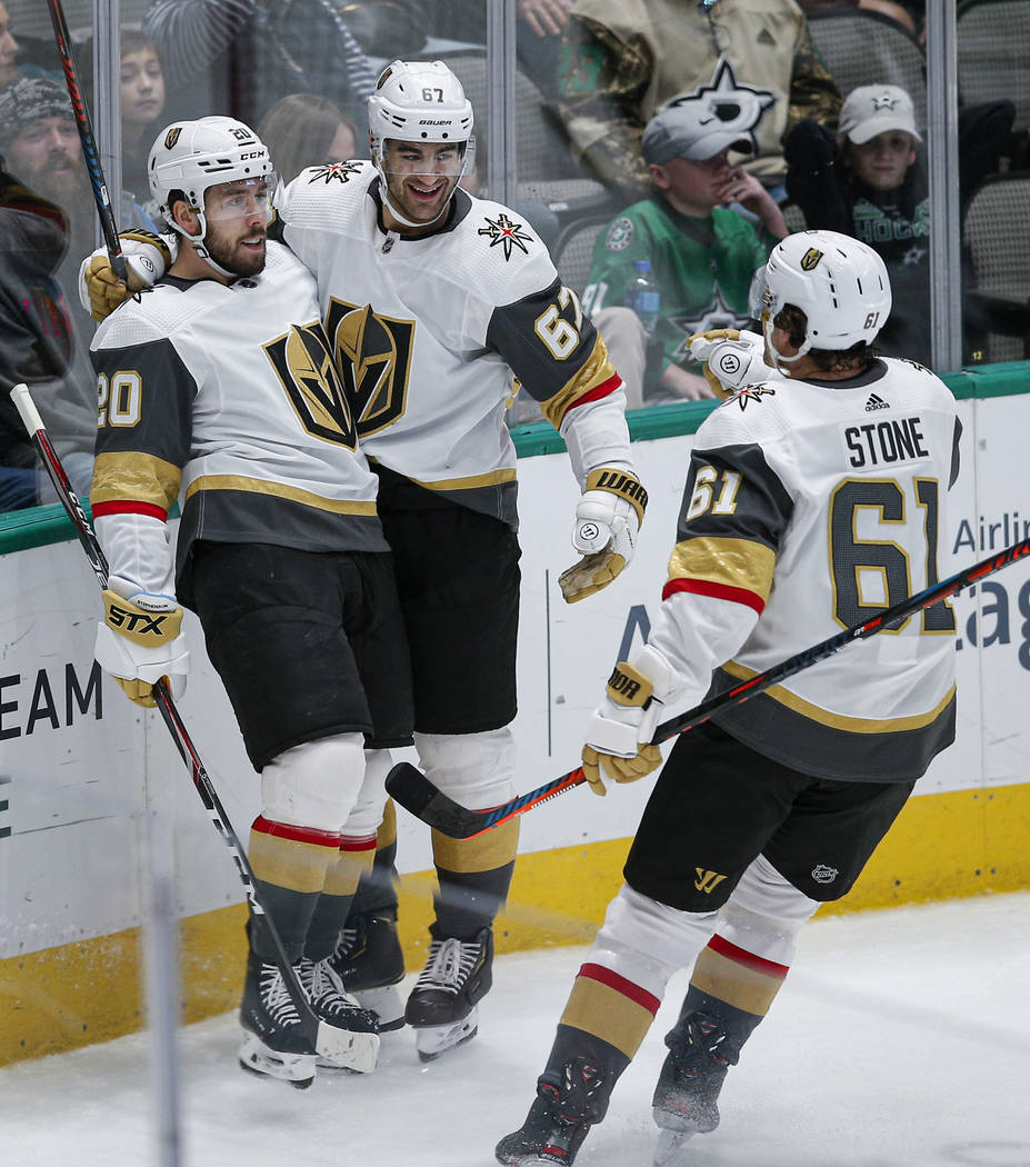 Vegas Golden Knights forward Chandler Stephenson (20) is congratulated by teammates after scori ...