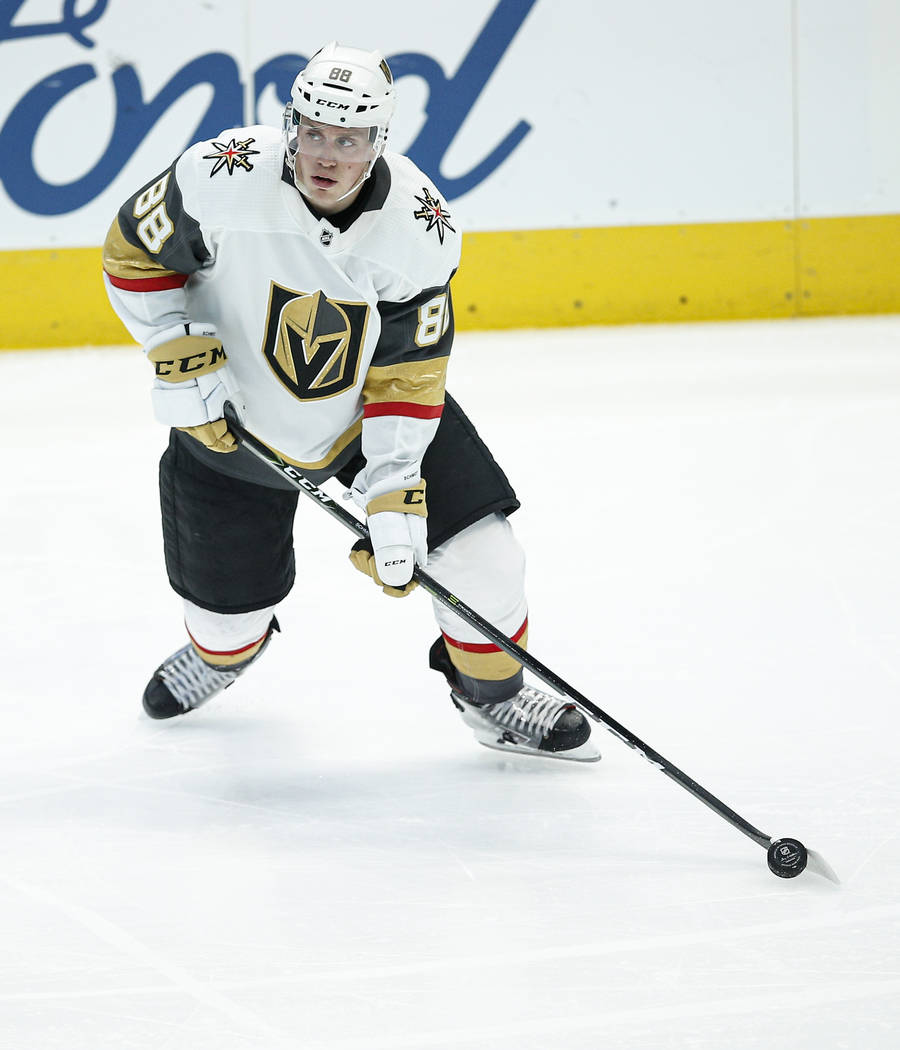 Vegas Golden Knights defenseman Nate Schmidt (88) looks to pass during the second period of an ...