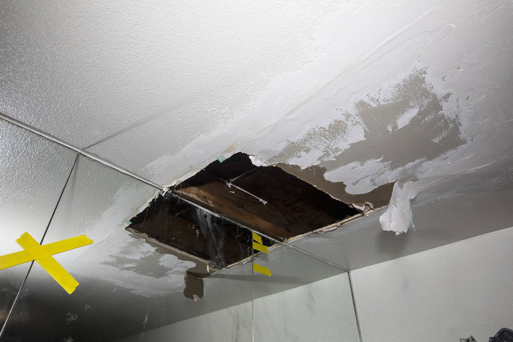 A leak had led to a hole forming in the master bedroom ceiling of John and Mary Bodimer's renta ...