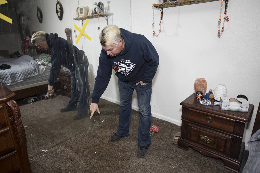 John Bodimer shows the Review-Journal where a leak in the roof of his Las Vegas rental home is ...