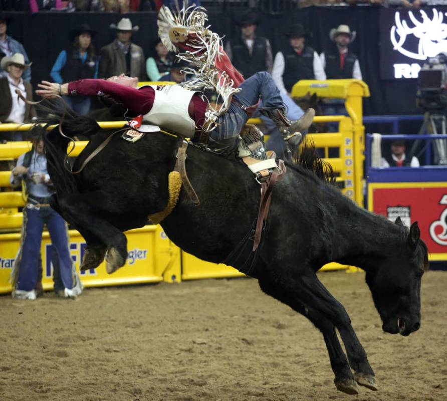 Tim O'Connell of Zwingle, Iowa rides Nutrena's Bad Influence during Bareback Riding in the eigh ...