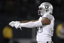 Oakland Raiders defensive end Clelin Ferrell (96) reacts after sacking Los Angeles Chargers qua ...