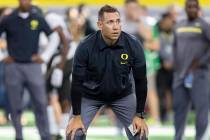 Oregon Ducks Assistant Head Coach Marcus Arroyo looks on during the AdvoCare Classic college fo ...