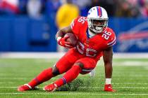 Buffalo Bills running back Devin Singletary (26) carries the ball during the second half of an ...
