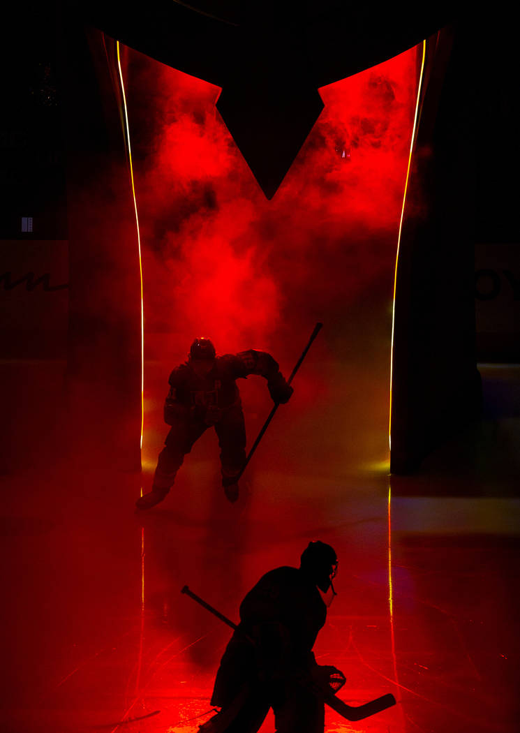 Vegas Golden Knights right wing Mark Stone (61) enters the ice through the helmet as Vegas Gold ...