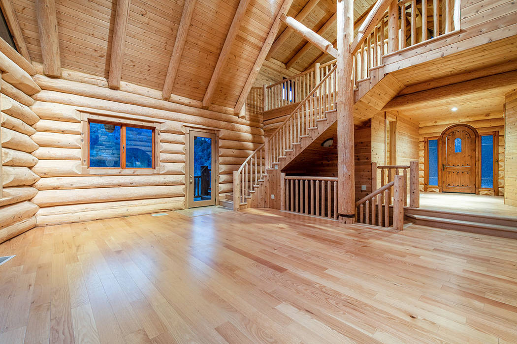 Berkshire Hathaway Home Services The owner purchased hand-hewn Douglas Fir logs from a craftsma ...