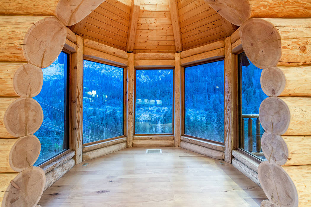 Berkshire Hathaway Home Services The views of the pine forest is the star of the home.