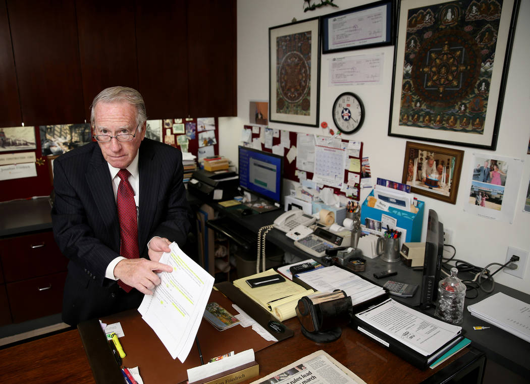 Jonathan Friedrich shows documents related to his case against the Rancho Bel Air Property Owne ...