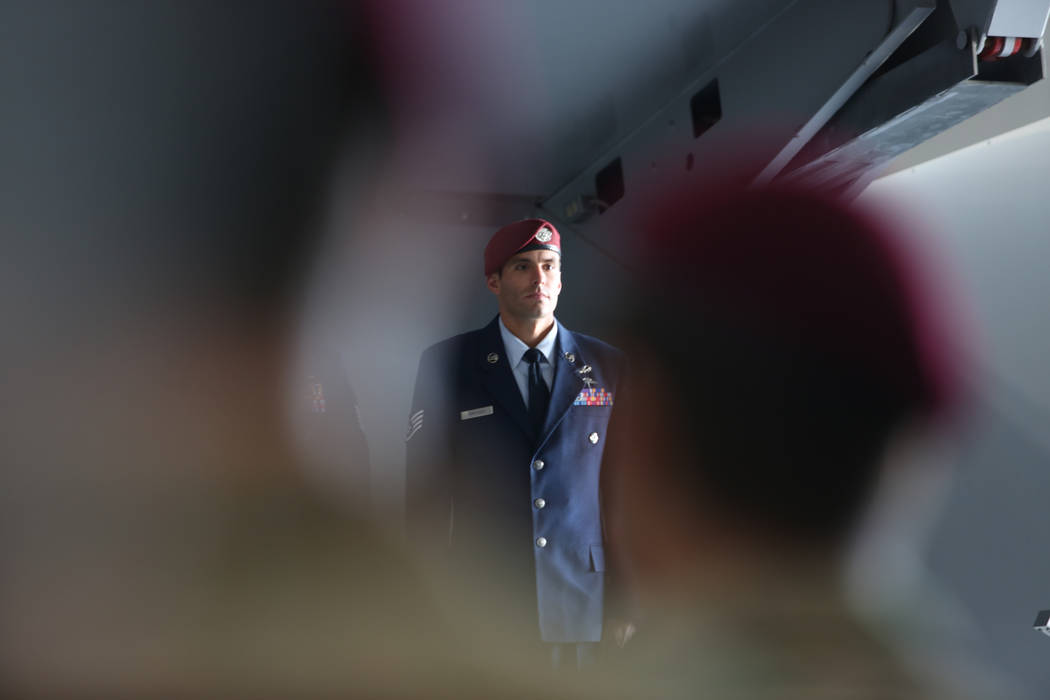 Staff Sgt. Daniel Swensen stands during a ceremony awarding the Silver Star Medal to Technical ...