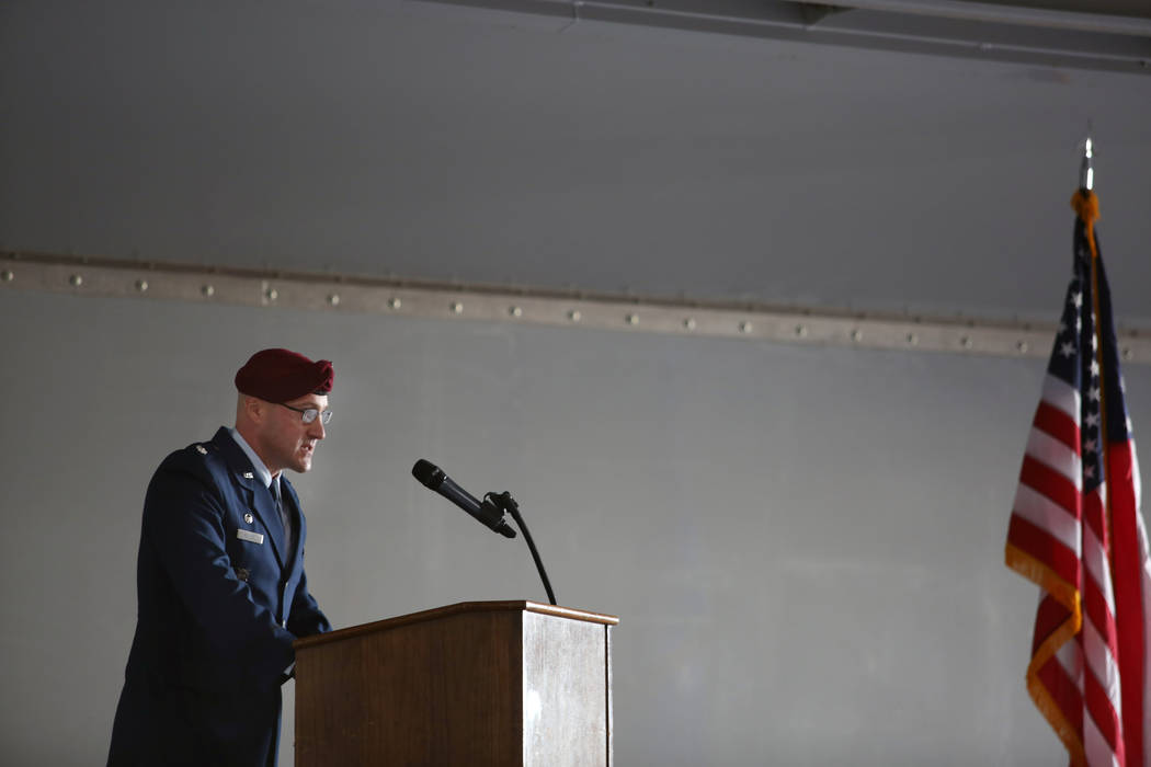 Lt. Col. Douglas Holliday gives a speech during a ceremony awarding the Purple Heart and Silver ...