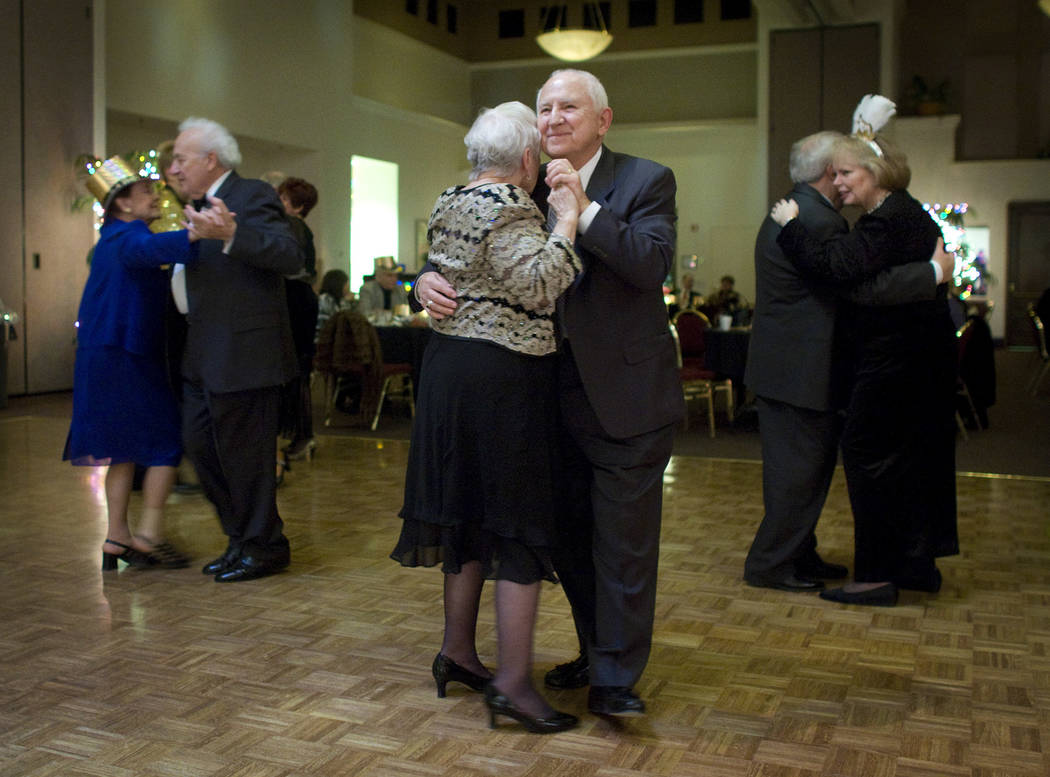Joe Daszek dances with Midge Howell at a New Year's Eve party in Sun City Summerlin on Dec. 31, ...
