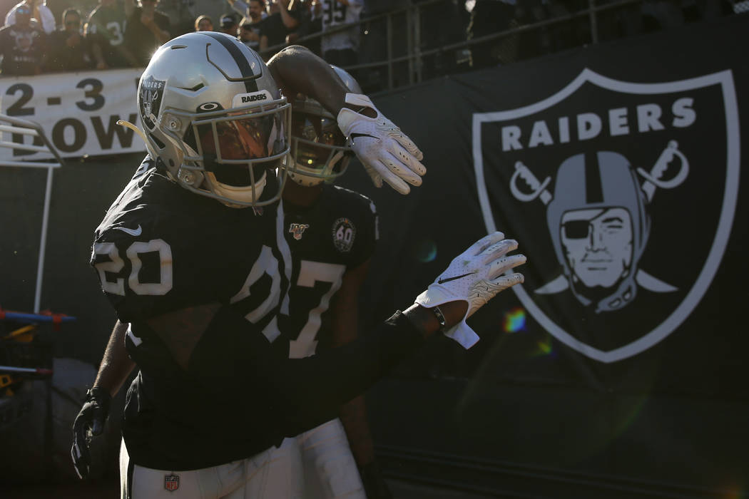 Oakland Raiders cornerback Daryl Worley (20) celebrates after intercepting a pass against the D ...