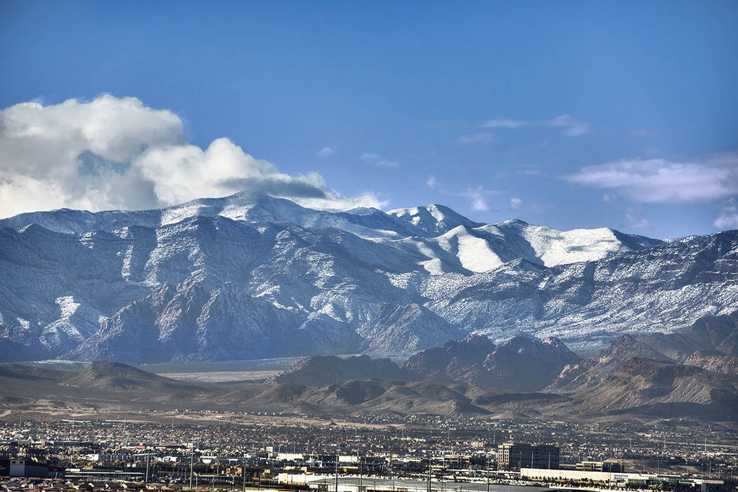 A recent view from the condo shows snow on the mountain. (One Las Vegas)