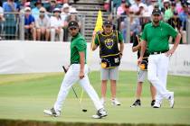 International team player Abraham Ancer of Mexico, left, and playing partner Marc Leishman of A ...