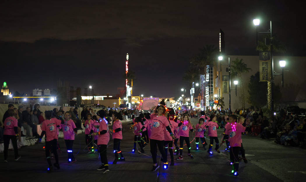The Jumping Dragons jumprope team is part of the parade at Henderson's annual WinterFest on Sat ...