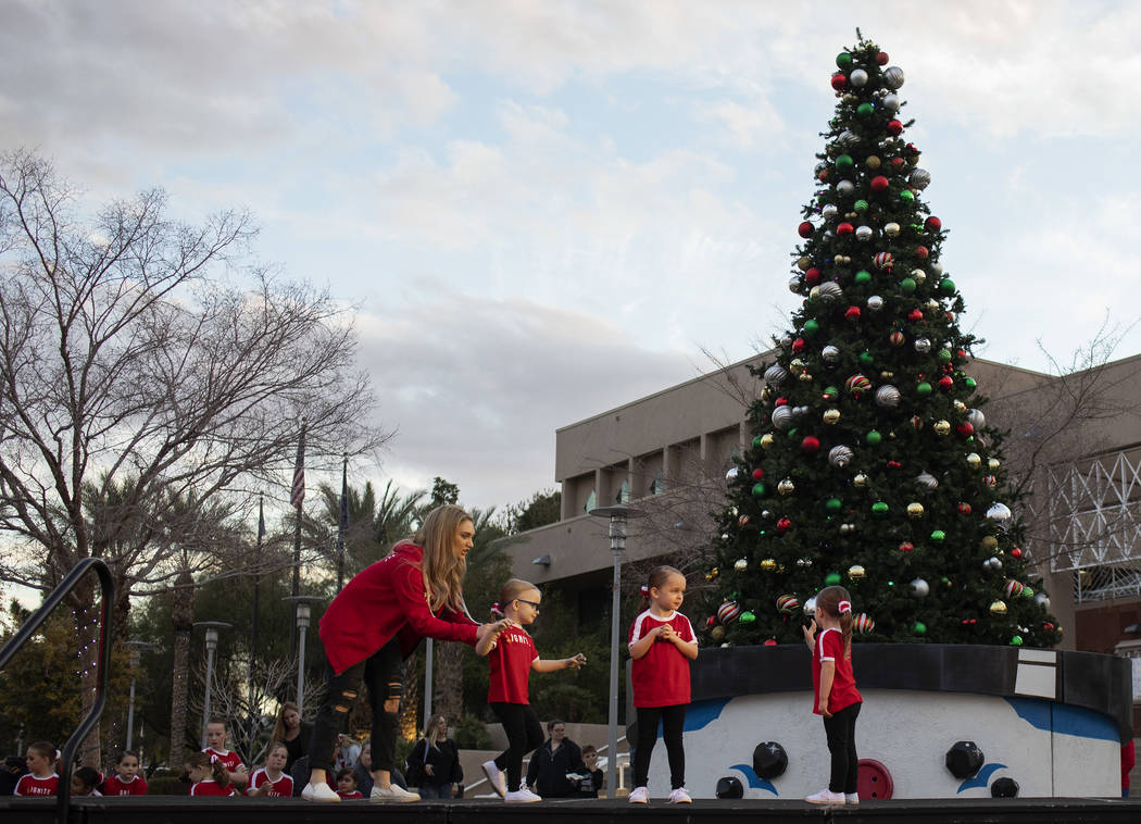 Members of Ignite Dance Center take the stage with the help of their instructor at Henderson's ...