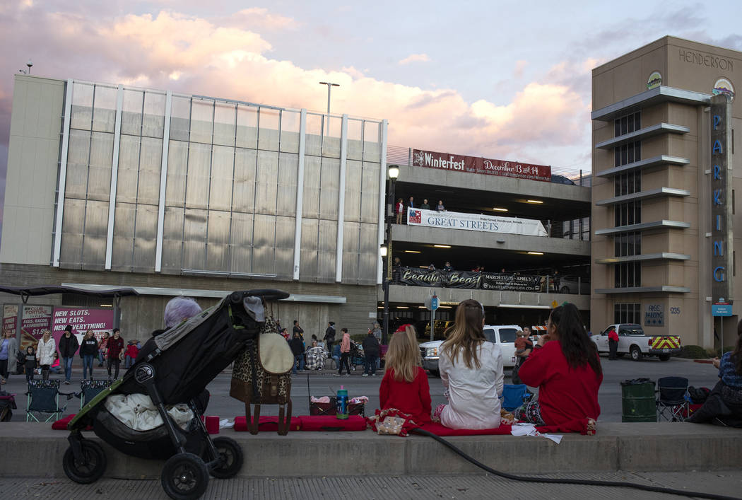 People line the street in anticipation of the parade at Henderson's annual WinterFest on Saturd ...