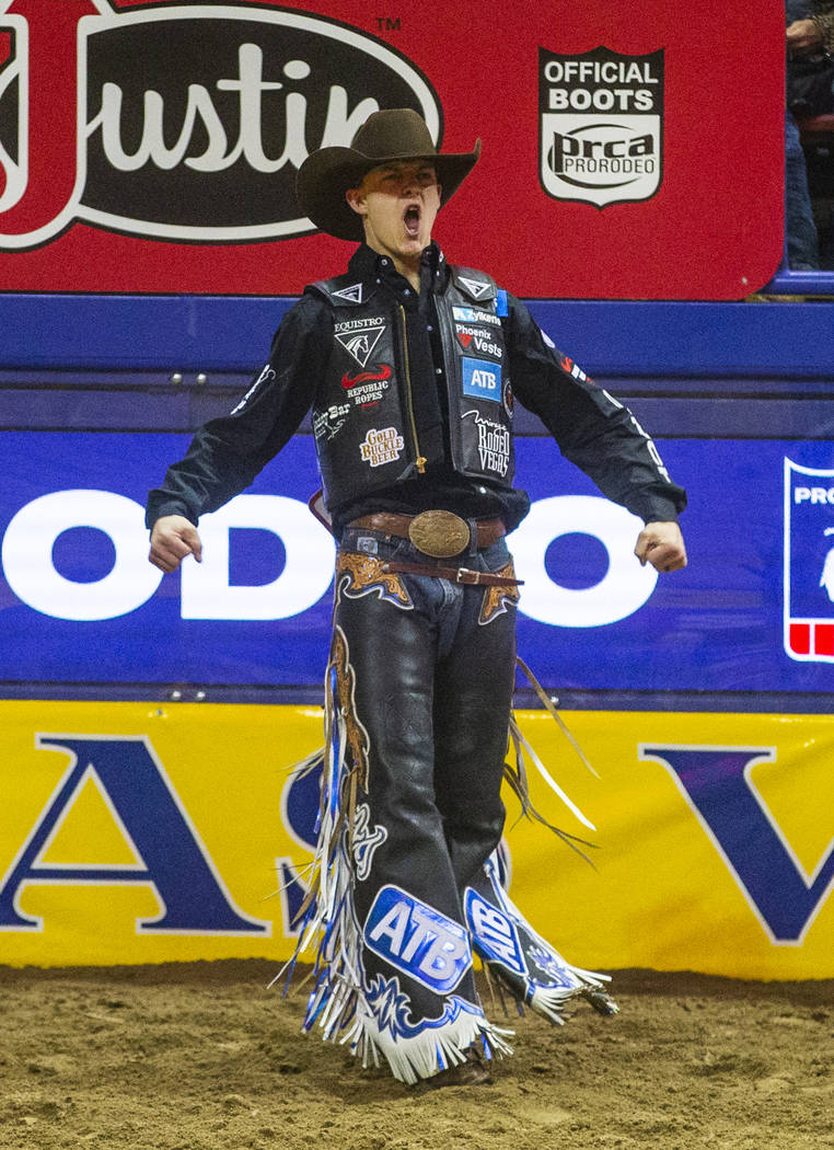 Zeke Thurston of Big Valley, Alberta, is pumped up after riding Kitty Whistle in Saddle Bronc R ...