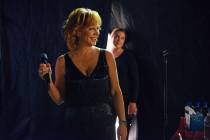 Reba McEntire sang "The Star Spangled Banner" during the Reba and Brooks & Dunn show at the Col ...