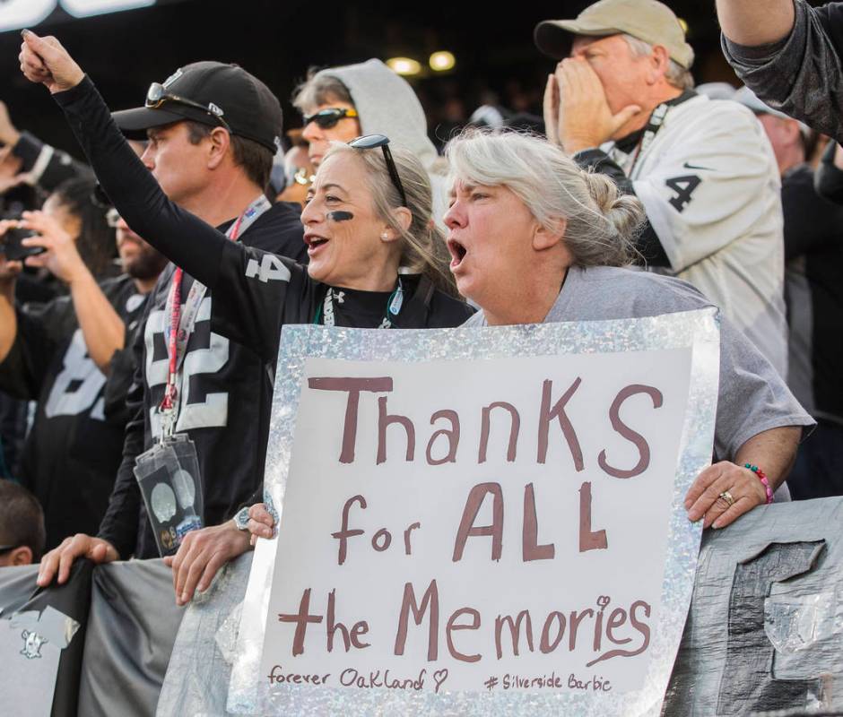 Raiders fans cheer for Oakland during an NFL football game with the Jacksonville Jaguars at the ...