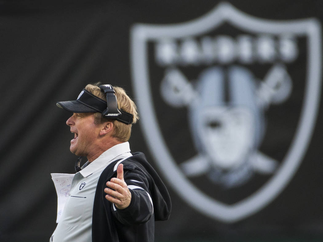 Oakland Raiders head coach Jon Gruden argues a call in the fourth quarter during an NFL footbal ...