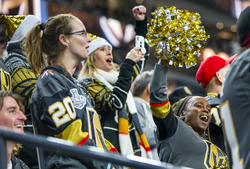 Vegas Golden Knights fans celebrate another goal over the Vancouver Canucks during the first p ...