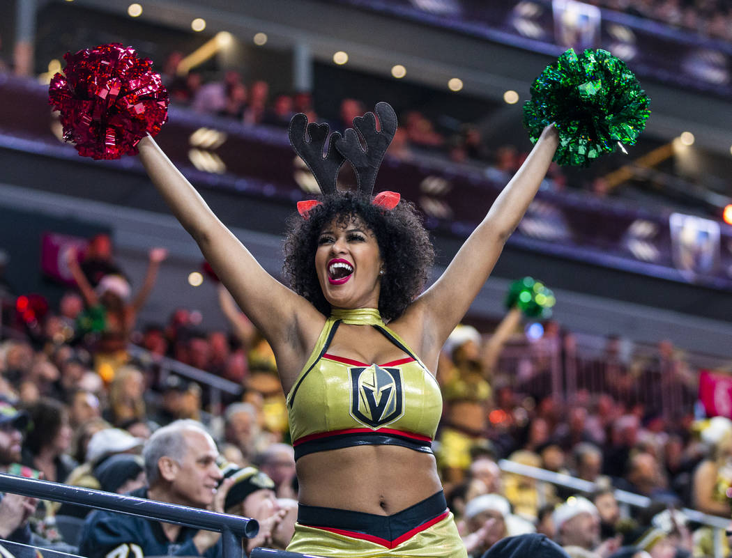 A Vegas Golden Knights Viva cheers for the fans and team versus the Vancouver Canucks during th ...