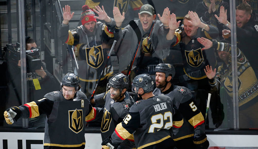 Fans cheer after Vegas Golden Knights left wing Max Pacioretty (67), second from left, scored a ...