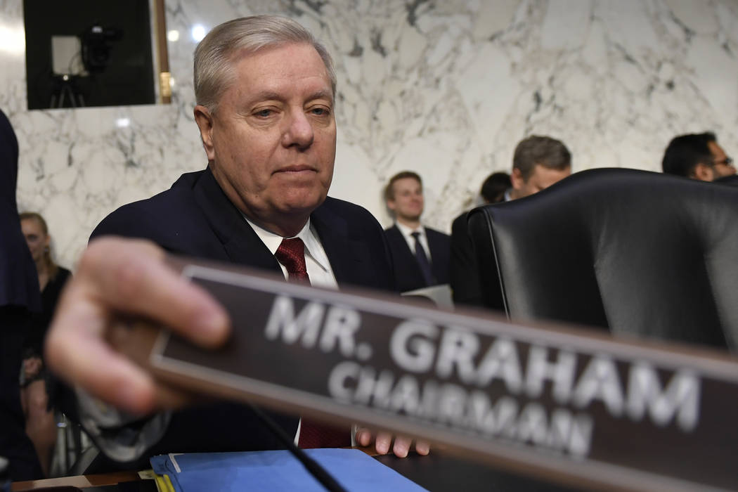 Senate Judiciary Committee Chairman Lindsey Graham, R-S.C., prepares for a hearing with Departm ...