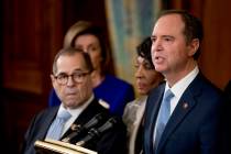 Rep. Adam Schiff, D-Calif., Chairman of the House Intelligence Committee, right, speaks with fr ...