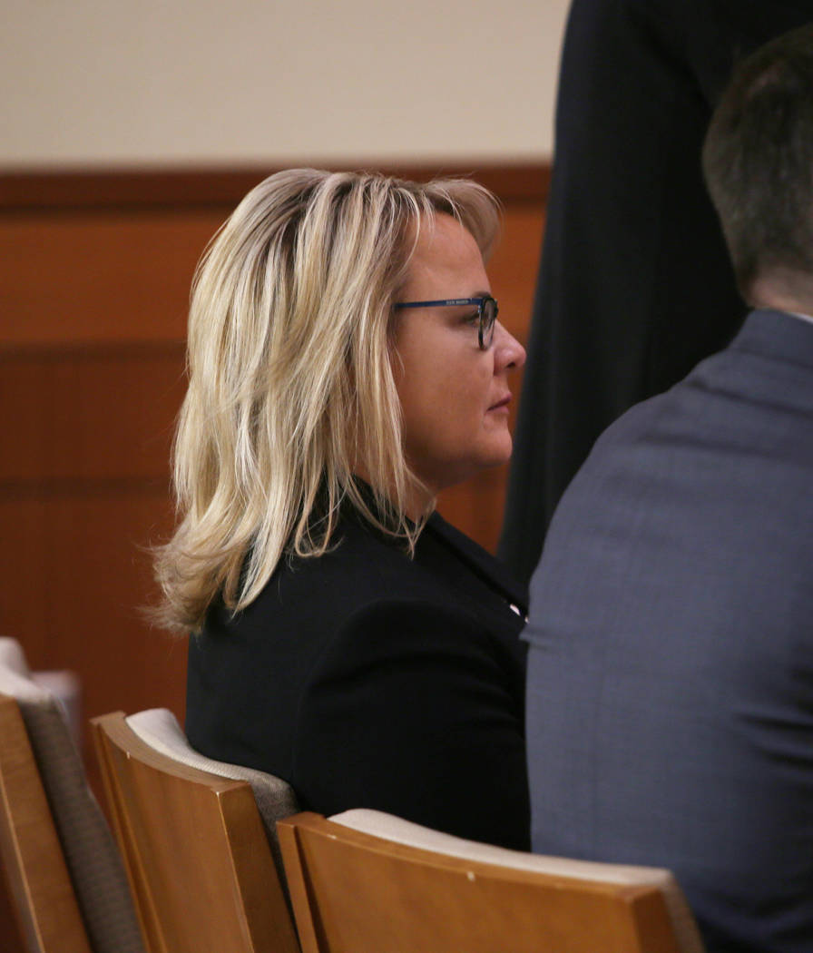 Justice of the Peace Amy Chelini listens to an opening statement by her attorney Thomas Pitaro ...