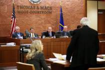 A panel of the Nevada Judicial Discipline Commission listens to an opening statement given by a ...