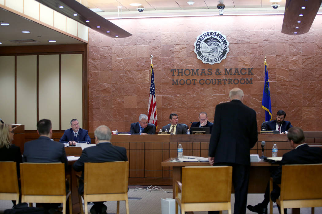 Former Las Vegas Justice Court administrator David Denson is questioned by Brian Hutchins, a pr ...