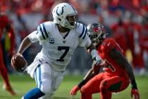 Indianapolis Colts quarterback Jacoby Brissett (7) runs away from Tampa Bay Buccaneers outside ...