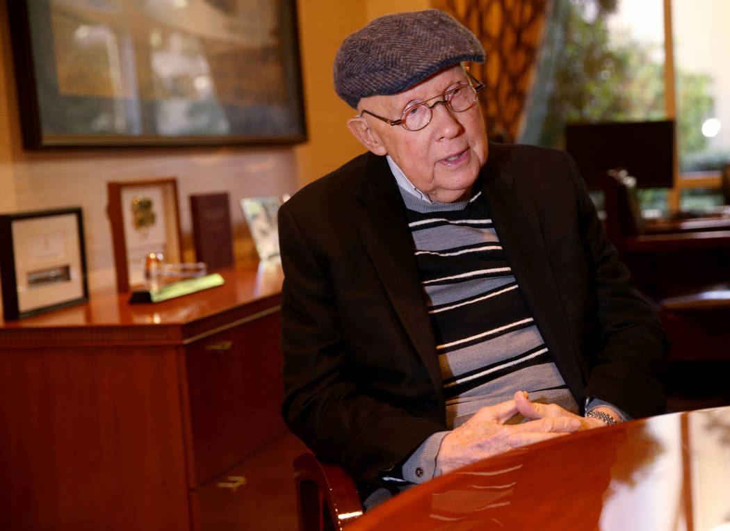 Former Nevada Sen. Harry Reid talks to a reporter in his office at the Bellagio in Las Vegas Mo ...
