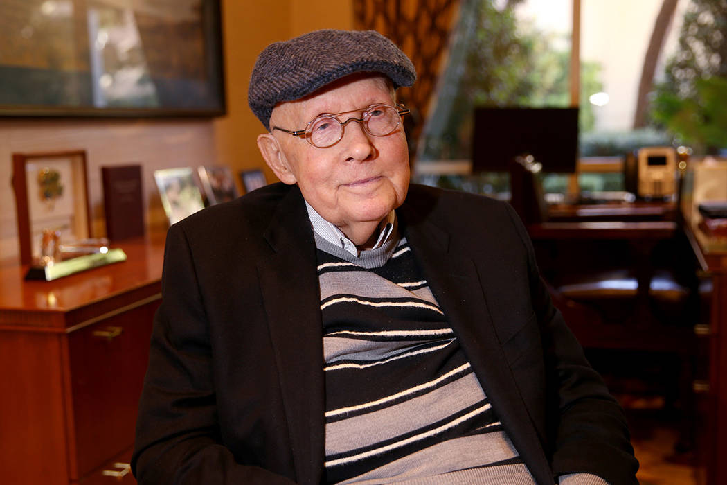 Former Nevada Sen. Harry Reid talks to a reporter in his office at the Bellagio in Las Vegas Mo ...