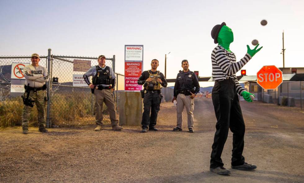 Scott Samford of Hollywood as an alien juggling mime entertains the security personnel at the b ...