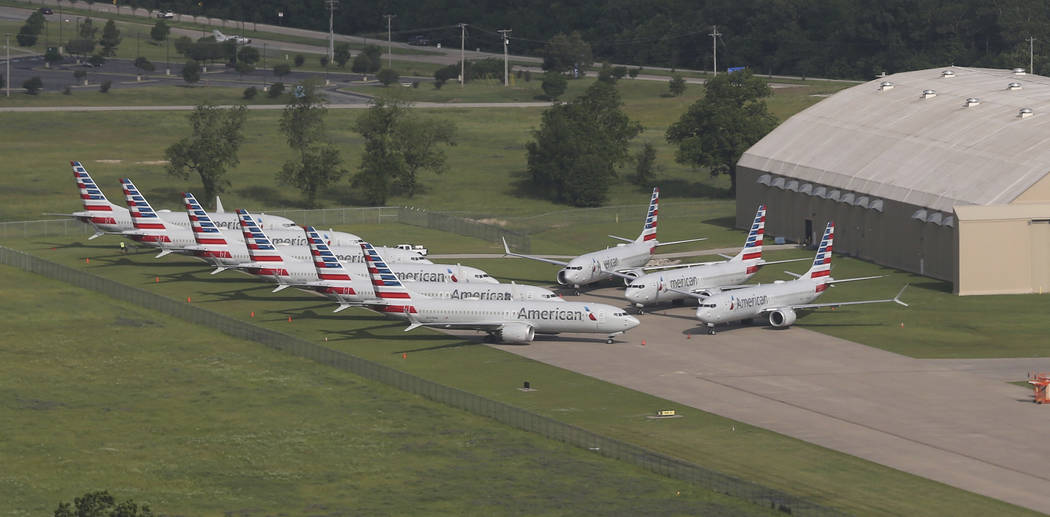 In a May 24, 2019 aerial photo, American Airlines 737 Max are stored at Tulsa International Air ...