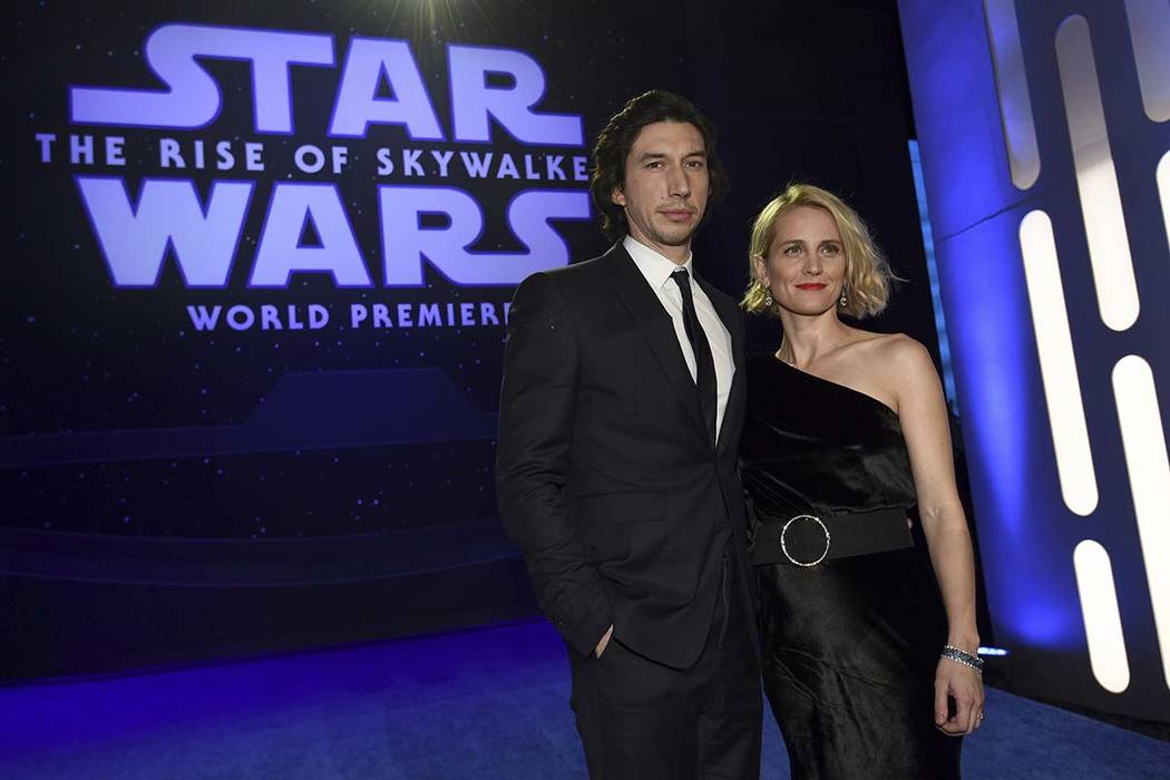 Adam Driver, left, and Joanne Tucker arrive at the world premiere of "Star Wars: The Rise ...