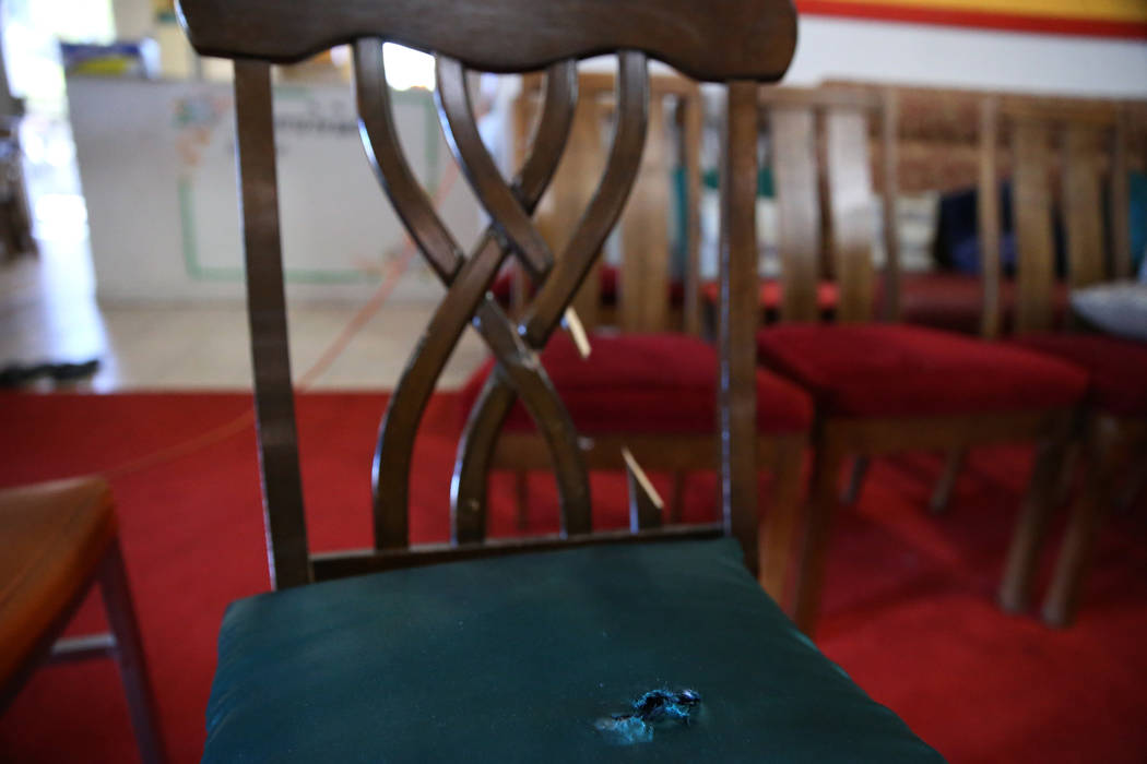 A bullet hole on a seat cushion at the Thai Buddhist Temple of Las Vegas in North Las Vegas, Tu ...