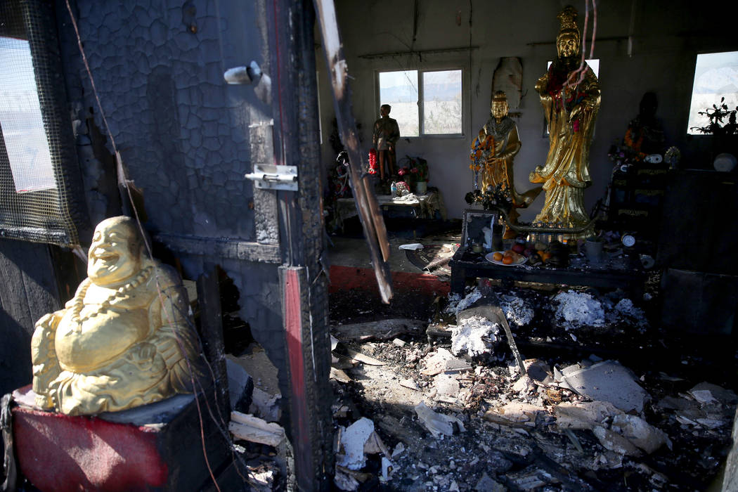 The ruin of the burned Thai Buddhist Temple of Las Vegas is seen in North Las Vegas, Tuesday, D ...