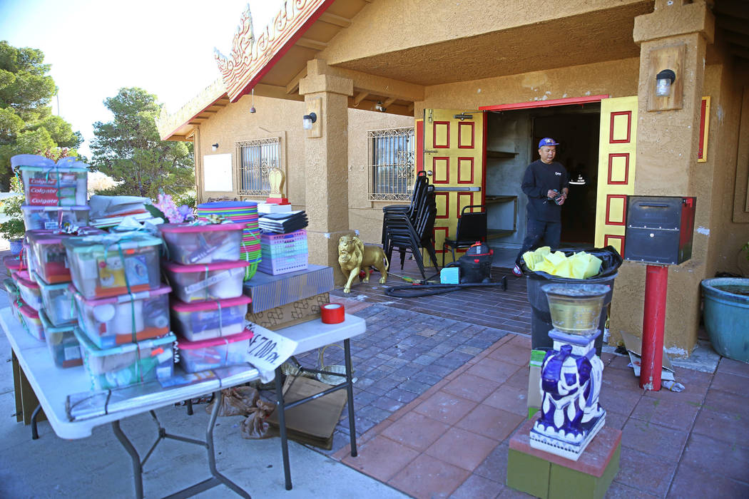 Boonkham Thasbut helps clean the Thai Buddhist Temple of Las Vegas in North Las Vegas, Tuesday, ...