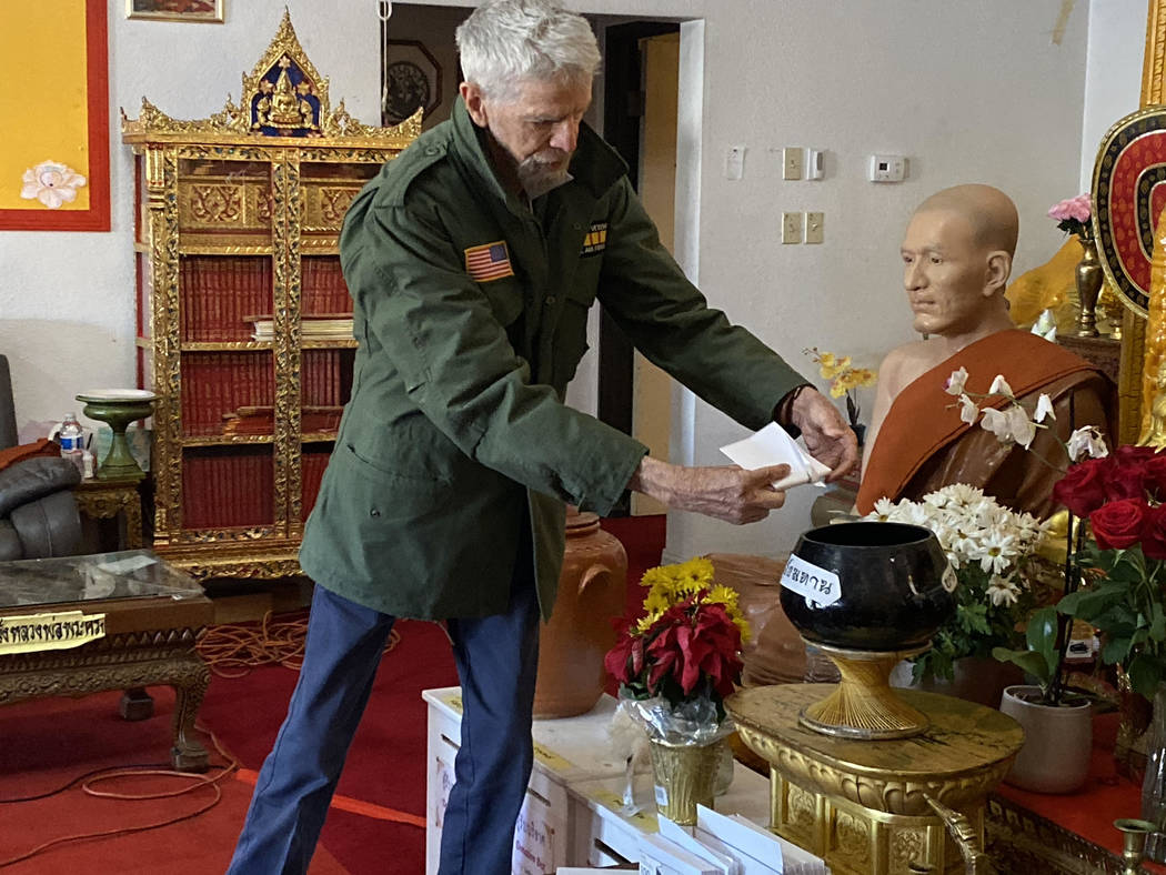 Vietnam veteran James Smales stops by the Thai Buddhist Temple of Las Vegas in North Las Vegas, ...